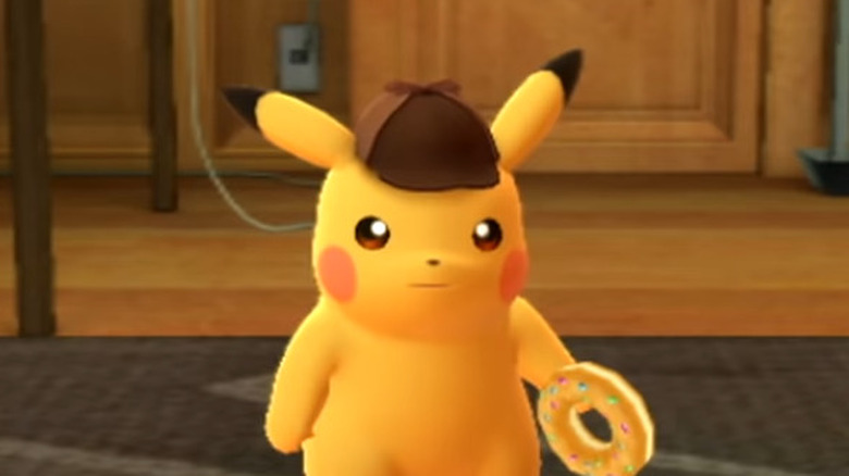 Detective Pikachu holding donut