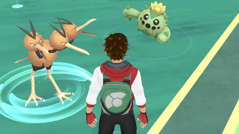 Pokemon GO trainer with Dodrio and Cacnea