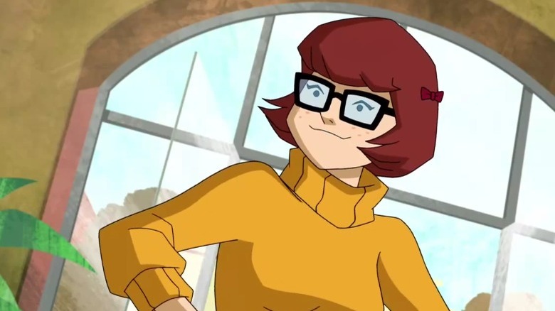 Velma in a power pose