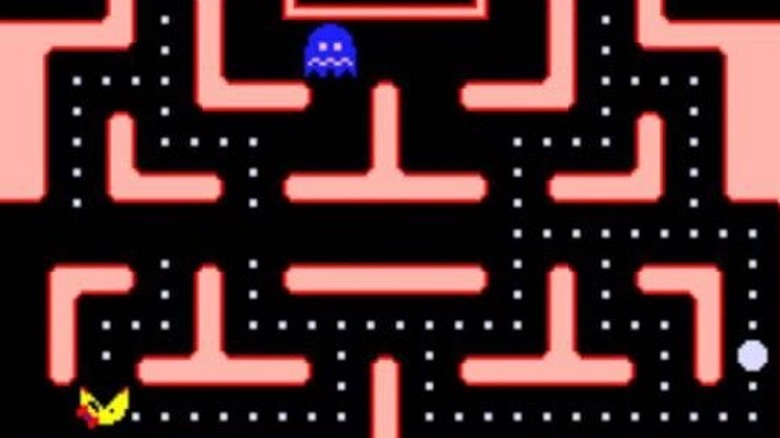 Ms. Pac-Man eating ghosts