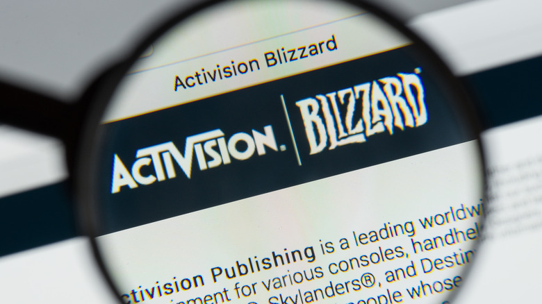 Activision Blizzard logo under magnifying glass