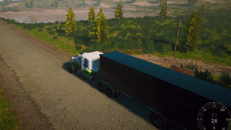 Truck driving through forest