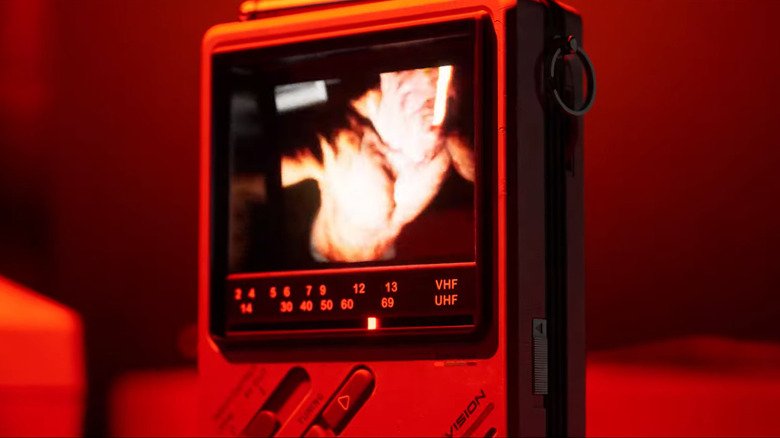 Screenshot of a mysterious monster on a radio within the "Silent Hill: Townfall" teaser trailer