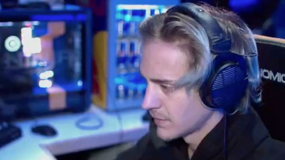 Ninja streaming with headphones on
