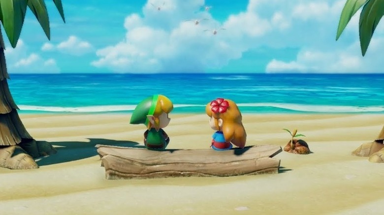 Marin and Link sitting on beach together