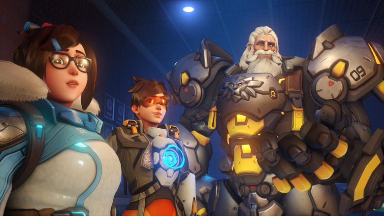 Tracer, Mei, and Reinhart standing together