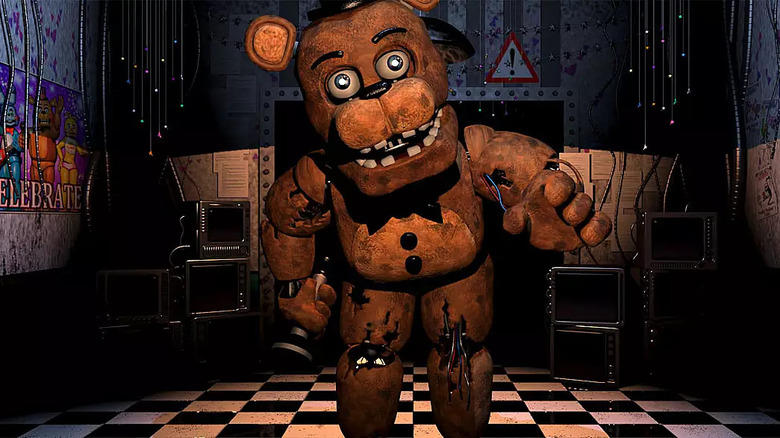 Freddy reaching for player