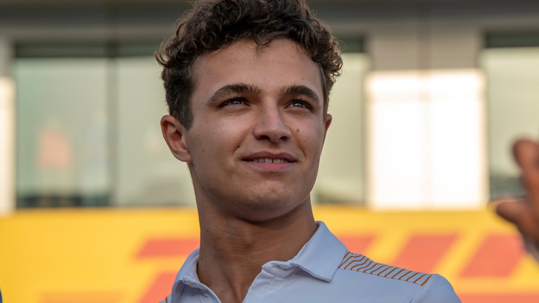 Lando Norris looking off into the distance