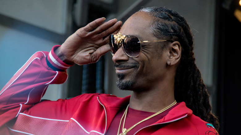 Snoop Dogg give a salute