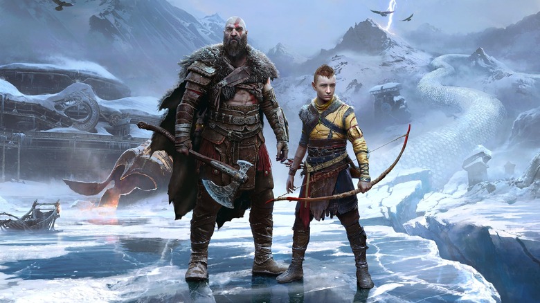 God of War Ragnarok Kratos and Atreus standing in snowy landscape