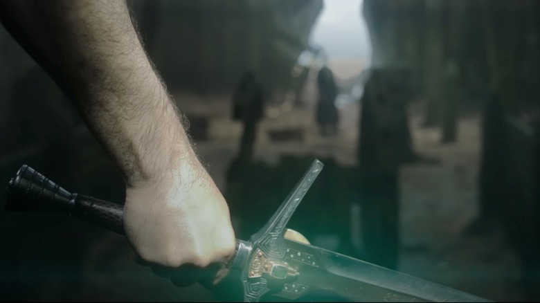 Geralt arm with sword