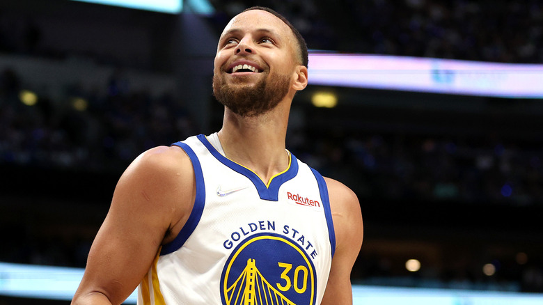 Steph Curry smiling running