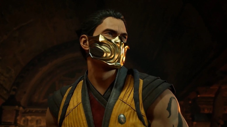 Scorpion wearing golden mask