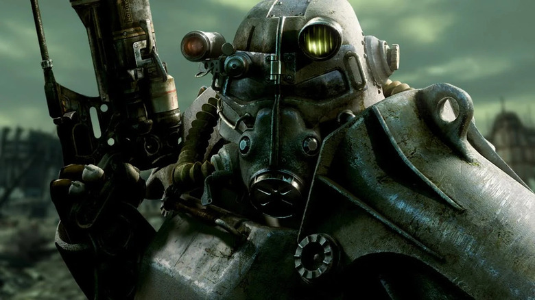 Power armor holding laser rifle