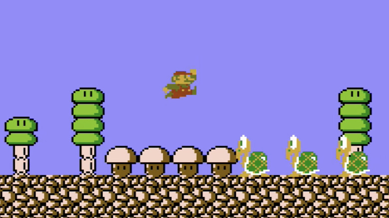 Mario jumping over koopas