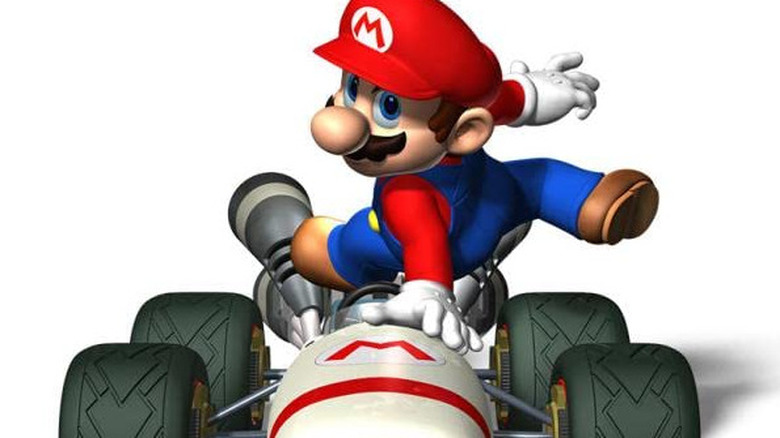 Mario jumping into his kart