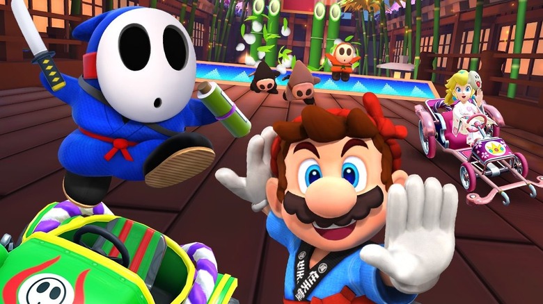 Mario, Shy Guy, and Peach racing