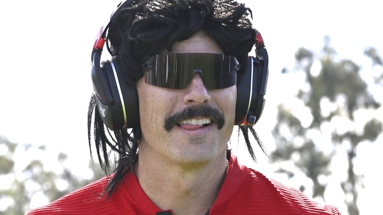 Dr Disrespect standing on golf course