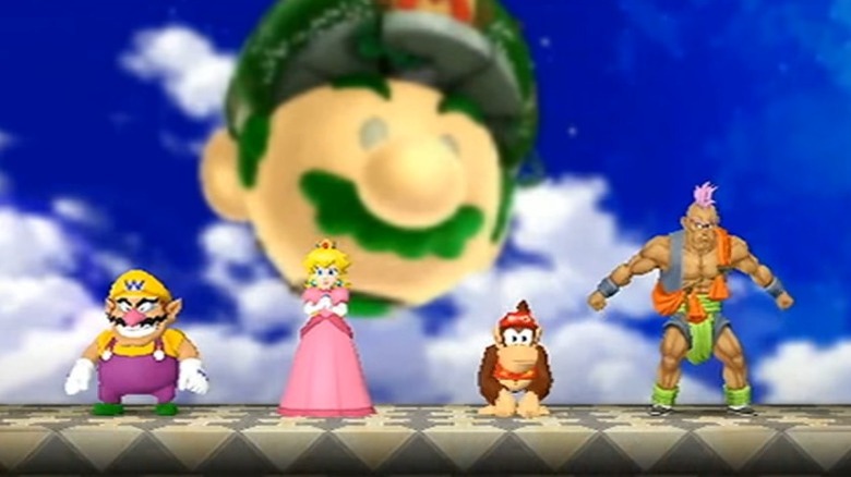 Peach standing on stage with other characters