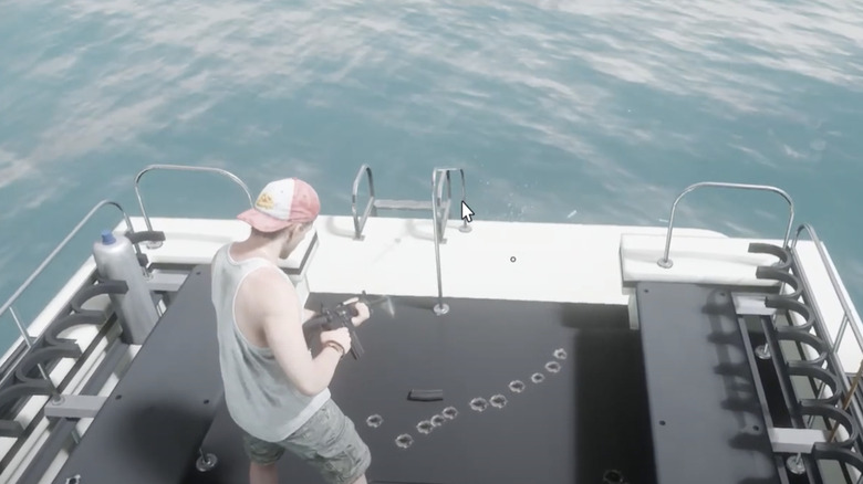 Jason holding a rifle on a boat