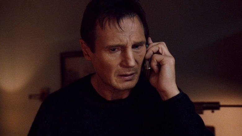Liam Neeson on phone