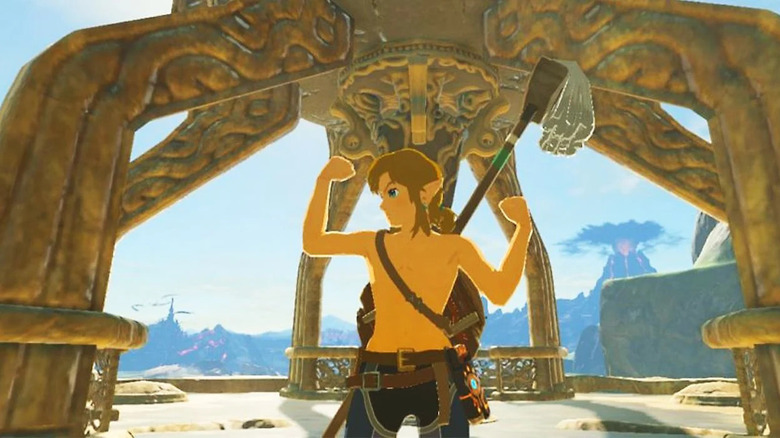 shirtless Link flexing