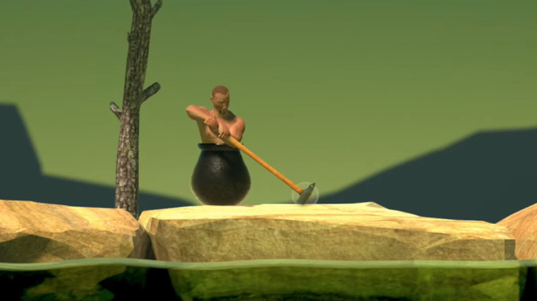 man in cauldron with hammer