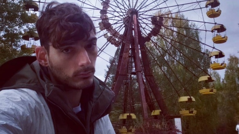 Ice Poseidon taking selfie at ferris wheel