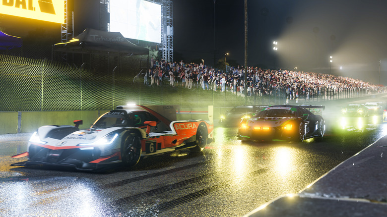 Forza Motorsport racing cars at night