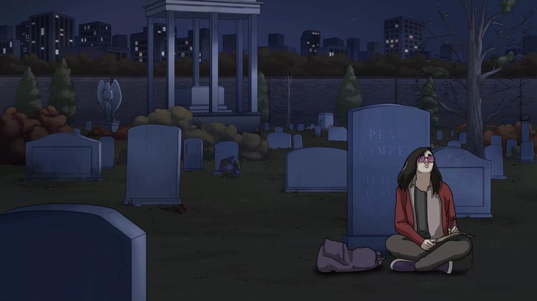 Drake sitting in cemetary