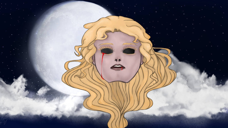 A floating severed head in front of the night sky
