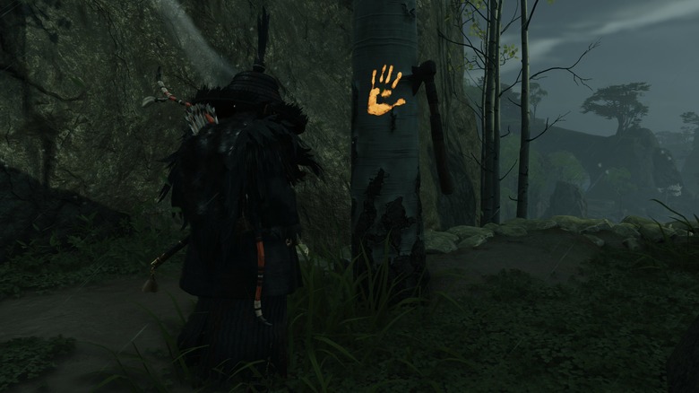 Ghost of Tsushima Jin stands near tree