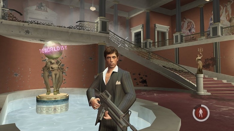 Tony Montana with world is yours statue