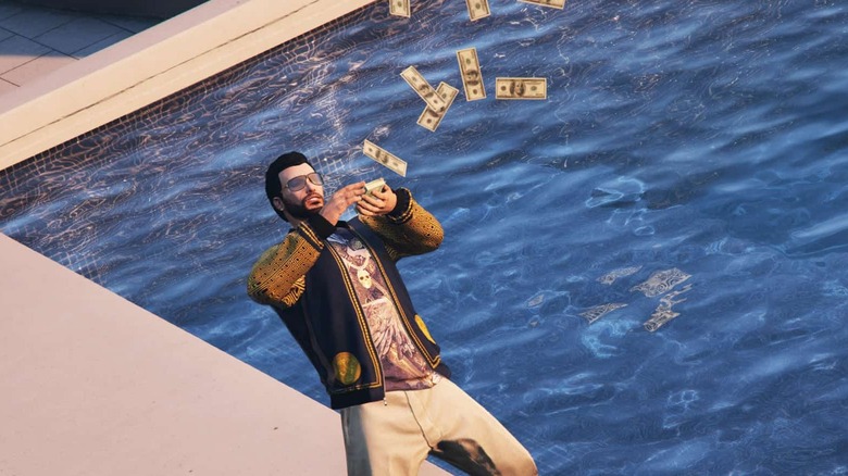 man throwing money by pool