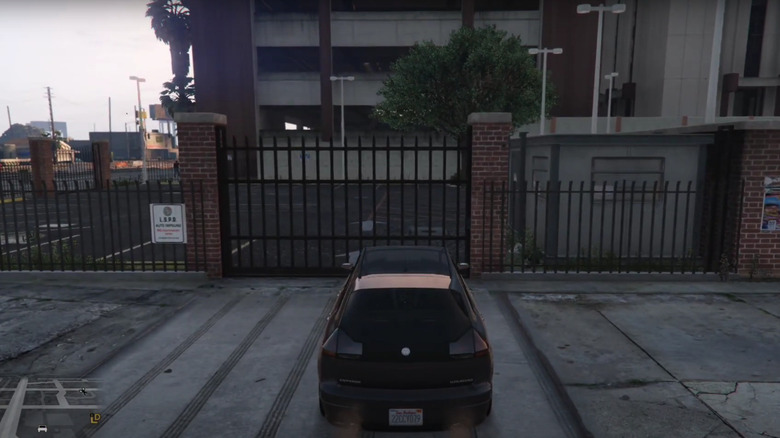 car parked in front of impound lot