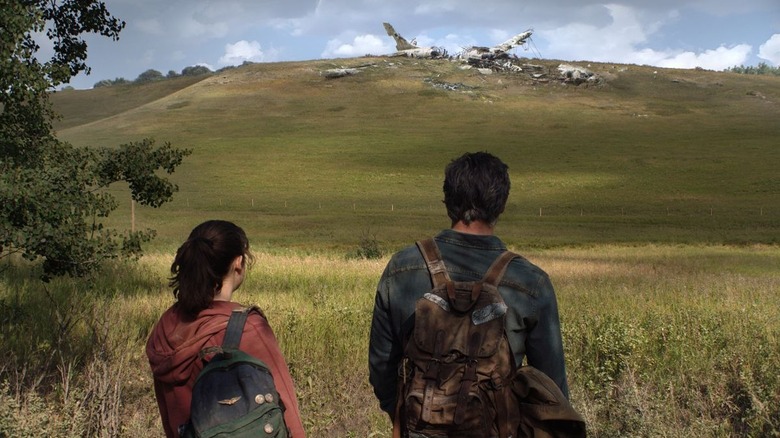 TLoU series Joel and Ellie in field