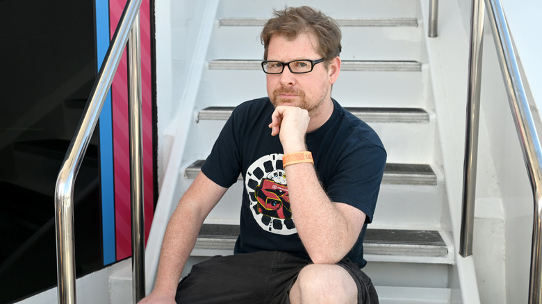 Justin Roiland sitting on boat