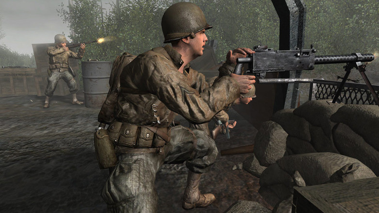 A soldier mans a machine gun