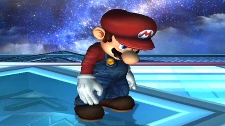 A dejected Mario stares sadly at the floor in Super Smash Bros.