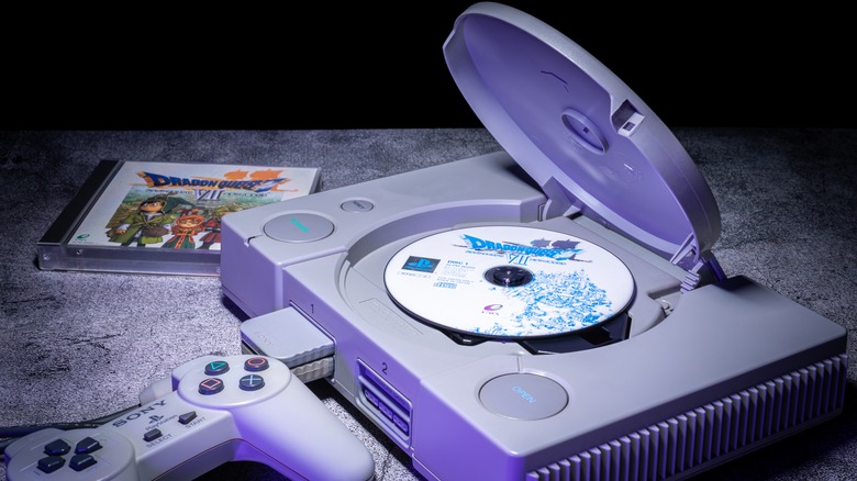 PS1 with Dragon Quest VII disc open