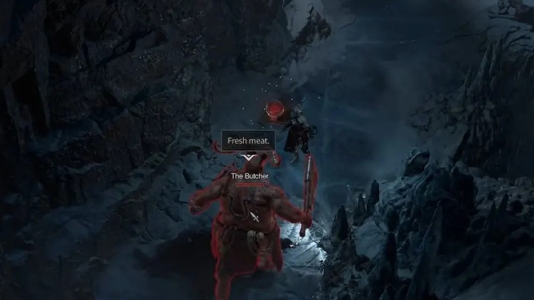 Character fighting the Butcher in a canyon