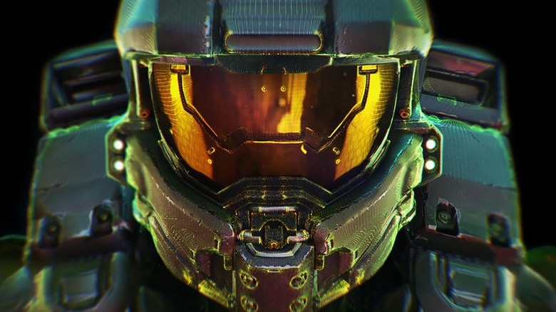 Master Chief donning helmet