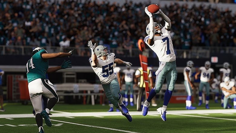 Cowboys player making leaping catch