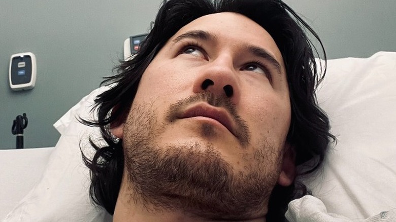 Markiplier lying in hospital bed looking up