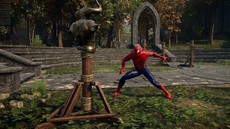 Spider-Man practicing his moves on a test dummy