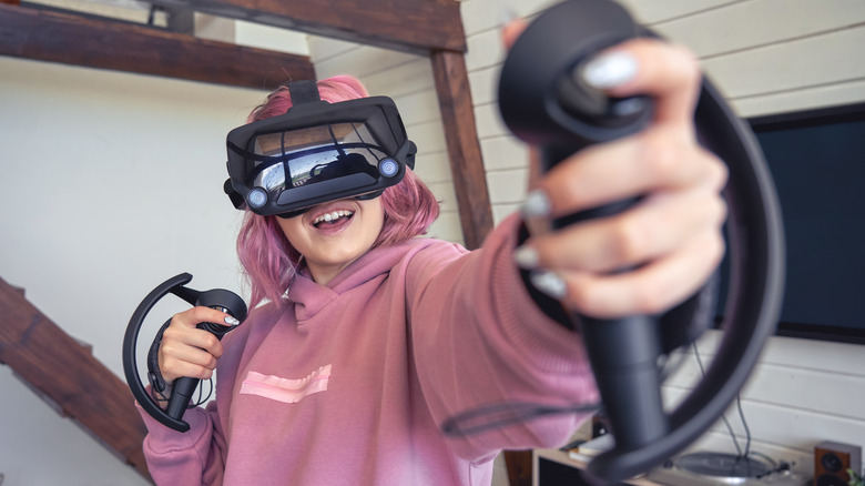 Valve Index user wielding controllers close to viewer