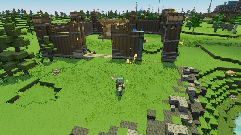 A player building a fort in "Minecraft Legends"
