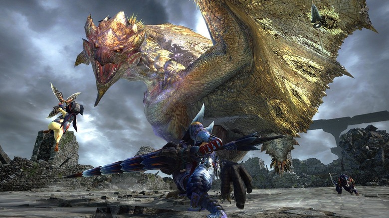 Hunters attacking Gold Rathian