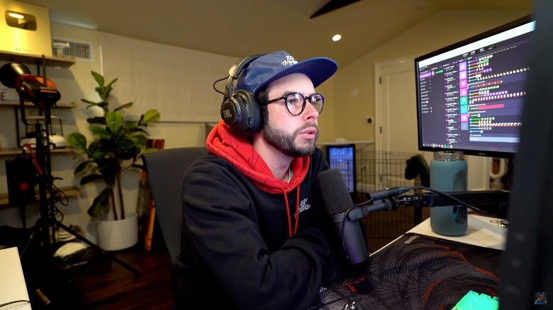 Nadeshot speaking surrounded by computers