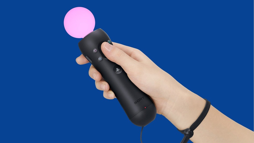 Hand holding PS Move